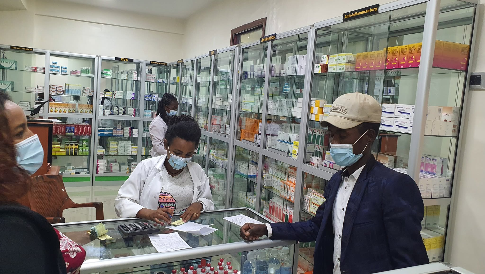 Hospital pharmacy with organized medicine shelves